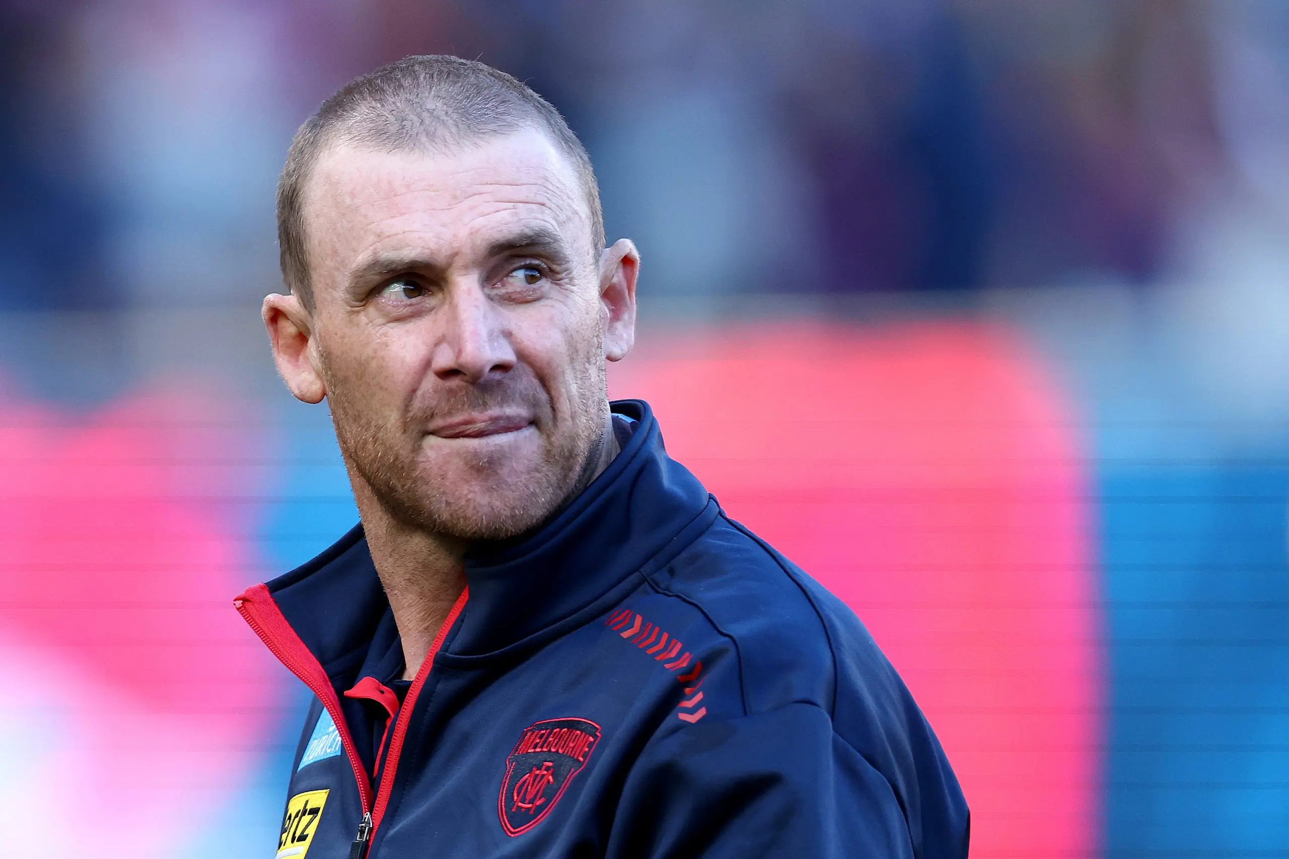 MELBOURNE, AUSTRALIA - MAY 10: Simon Goodwin, Senior Coach of the Demons looks on during the round nine AFL match between Melbourne Demons and Hawthorn Hawks at Melbourne Cricket Ground, on May 10, 2025, in Melbourne, Australia. (Photo by Josh Chadwick/AFL Photos/via Getty Images)