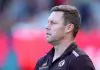 MELBOURNE, AUSTRALIA - MAY 10: Sam Mitchell, Senior Coach of the Hawks looks on during the round nine AFL match between Melbourne Demons and Hawthorn Hawks at Melbourne Cricket Ground, on May 10, 2025, in Melbourne, Australia. (Photo by Josh Chadwick/AFL Photos/via Getty Images)
