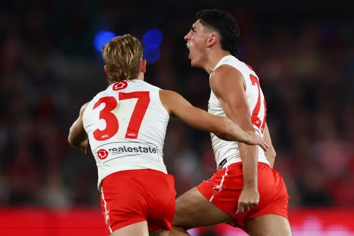 MELBOURNE, AUSTRALIA - MAY 10: Justin McInerney of the Swans celebrates a goal during the round nine AFL match between Essendon Bombers and Sydney Swans at Marvel Stadium, on May 10, 2025, in Melbourne, Australia. (Photo by Morgan Hancock/Getty Images)