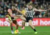 ADELAIDE, AUSTRALIA - MAY 10: Jordan Dawson of the Crows competes with Miles Bergman of the Power  during the round nine AFL match between Port Adelaide Power and Adelaide Crows at Adelaide Oval, on May 10, 2025, in Adelaide, Australia. (Photo by Mark Brake/Getty Images)
