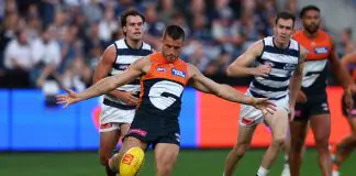 GEELONG, AUSTRALIA - MAY 11: Xavier O'Halloran of the Giants kicks during the round nine AFL match between Geelong Cats and GWS Giants at GMHBA Stadium on May 11, 2025 in Geelong, Australia. (Photo by Graham Denholm/AFL Photos/Getty Images)