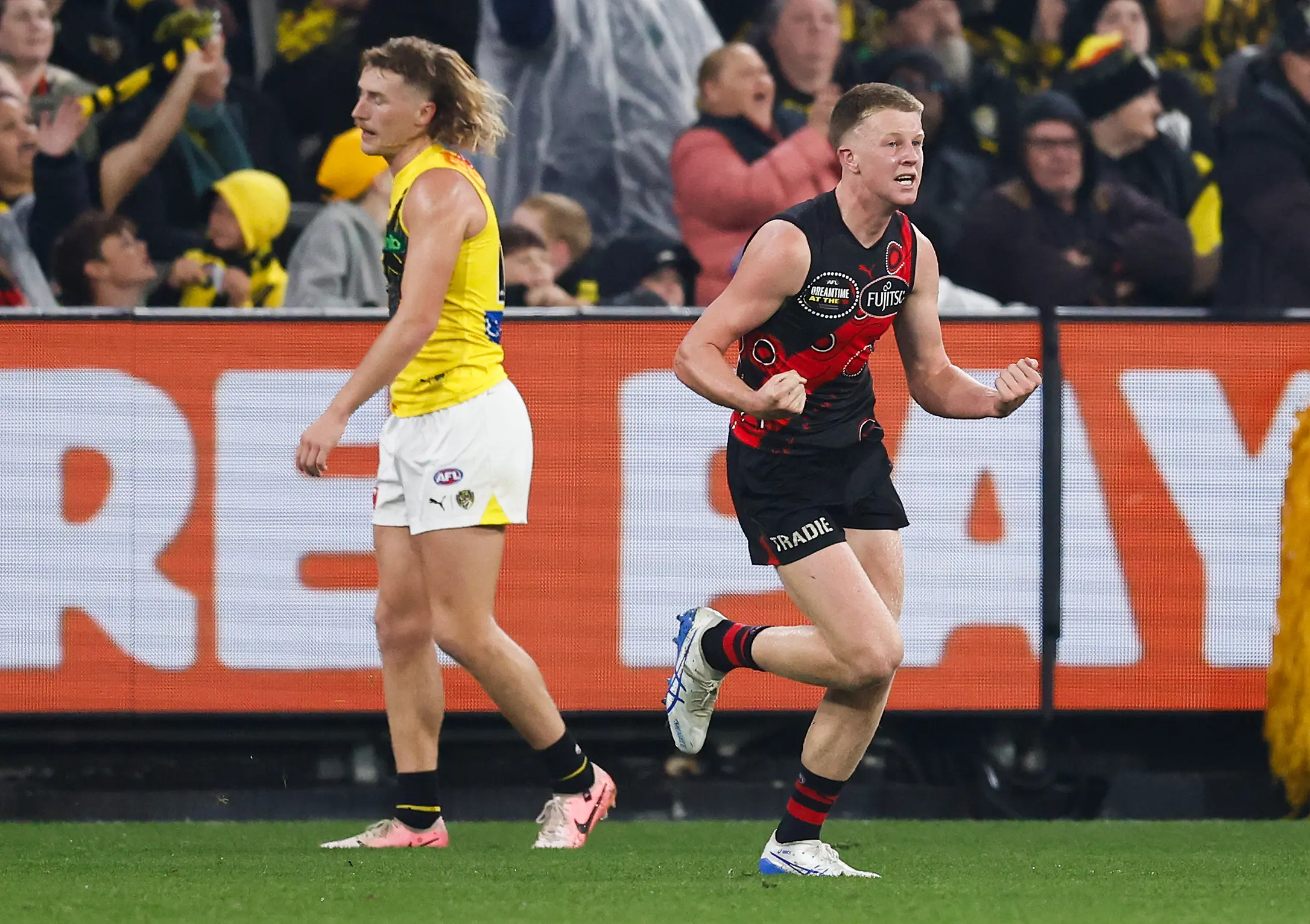 MELBOURNE, AUSTRALIA - MAY 23: Debutant, Angus Clarke of the Bombers celebrates his first league goal during the 2025 AFL Round 11 match between the Essendon Bombers and the Richmond Tigers at the Melbourne Cricket Ground on May 23, 2025 in Melbourne, Australia. (Photo by Michael Willson/AFL Photos via Getty Images)