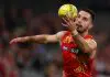 MELBOURNE, AUSTRALIA - MAY 25: Brayden Fiorini of the Suns takes possession of the ball during the round 11 AFL match between Euro-Yroke (Saint Kilda Saints) and Gold Coast Suns at Marvel Stadium, on May 25, 2025, in Melbourne, Australia. (Photo by Morgan Hancock/Getty Images)