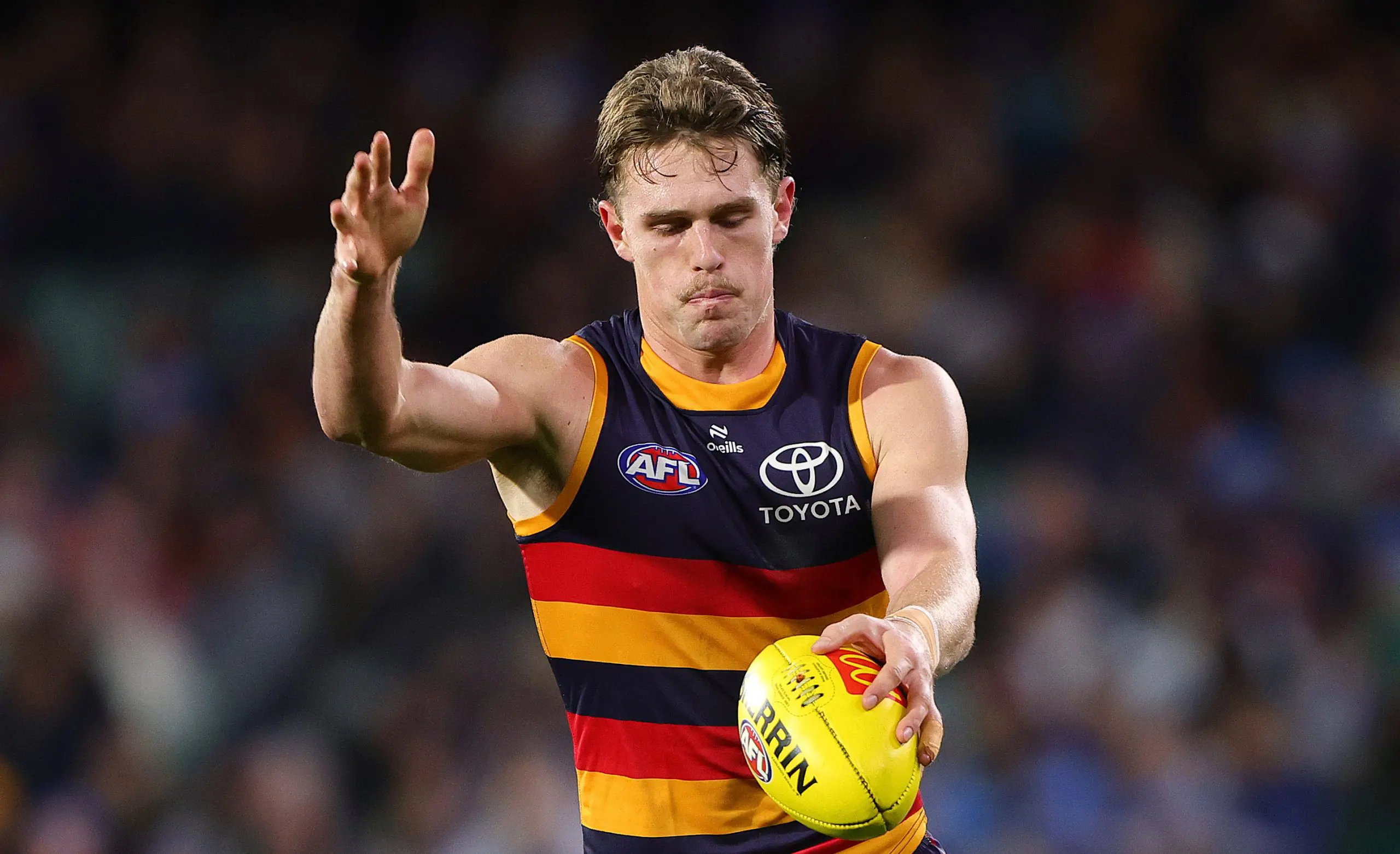 ADELAIDE, AUSTRALIA - JUNE 06: Daniel Curtin of the Crows during the 2025 AFL Round 13 match between the Adelaide Crows and the Brisbane Lions at Adelaide Oval on June 6, 2025 in Adelaide, Australia. (Photo by Sarah Reed/AFL Photos)