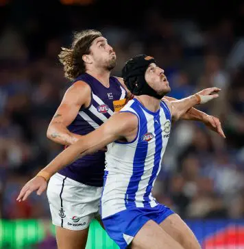 MELBOURNE, AUSTRALIA - MARCH 23: Luke Jackson of the Dockers and Tristan Xerri of the Kangaroos compete in a ruck contest during the 2024 AFL Round 2 match between the North Melbourne Kangaroos and the Fremantle Dockers on March 23, 2024 in Melbourne, Australia. (Photo by Dylan Burns/AFL Photos via Getty Images)