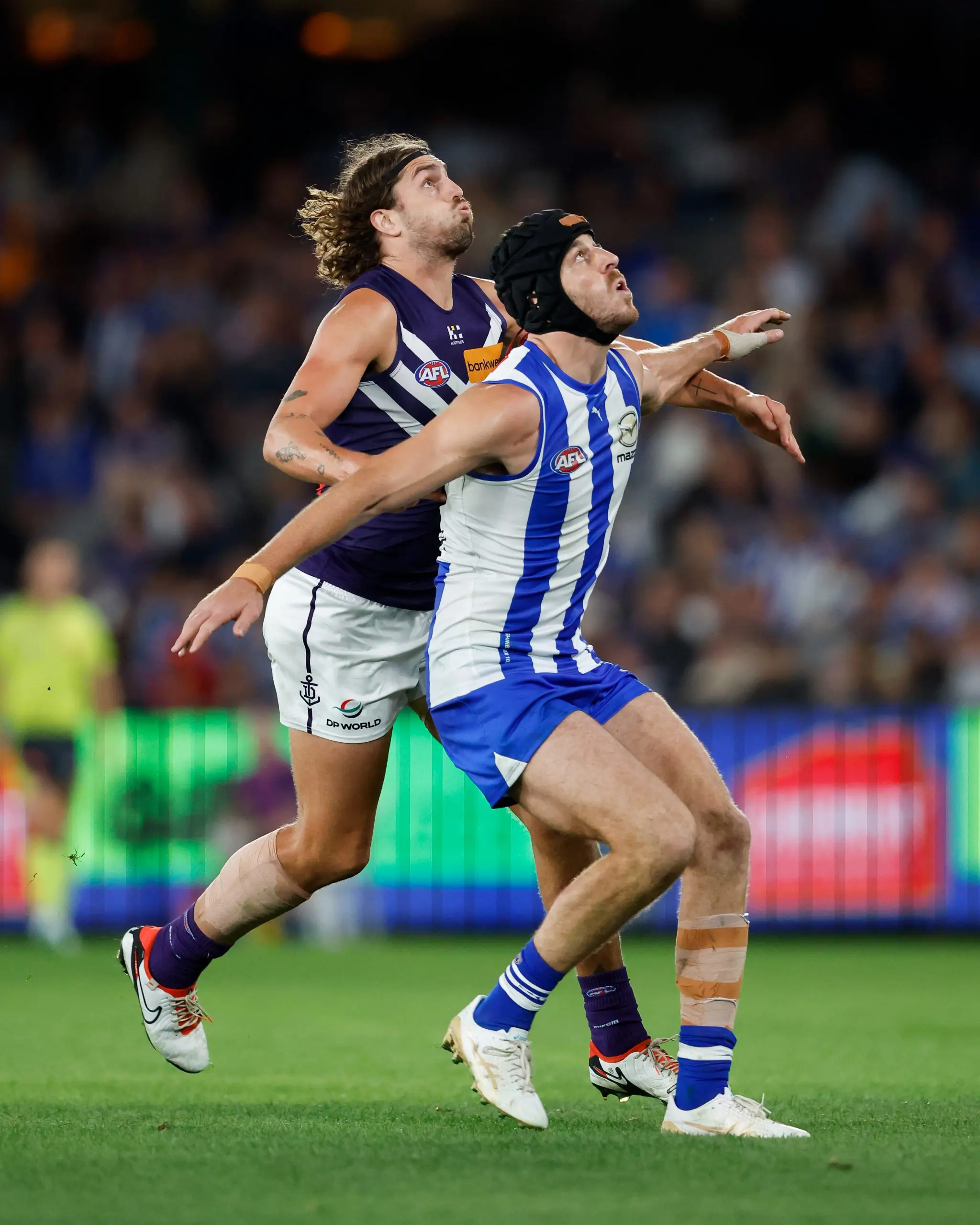 MELBOURNE, AUSTRALIA - MARCH 23: Luke Jackson of the Dockers and Tristan Xerri of the Kangaroos compete in a ruck contest during the 2024 AFL Round 2 match between the North Melbourne Kangaroos and the Fremantle Dockers on March 23, 2024 in Melbourne, Australia. (Photo by Dylan Burns/AFL Photos via Getty Images)
