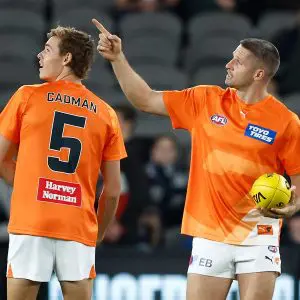 MELBOURNE, AUSTRALIA - APRIL 20: Aaron Cadman (left) and Jesse Hogan of the Giants warm up during the 2024 AFL Round 06 match between the Carlton Blues and the GWS GIANTS at Marvel Stadium on April 20, 2024 in Melbourne, Australia. (Photo by Michael Willson/AFL Photos via Getty Images)