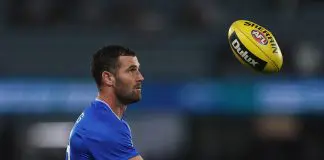 MELBOURNE, AUSTRALIA - APRIL 18: Jack Darling of the Kangaroos warms up ahead of the round six AFL match between North Melbourne Kangaroos and Carlton Blues at Marvel Stadium, on April 18, 2025, in Melbourne, Australia. (Photo by Daniel Pockett/Getty Images)