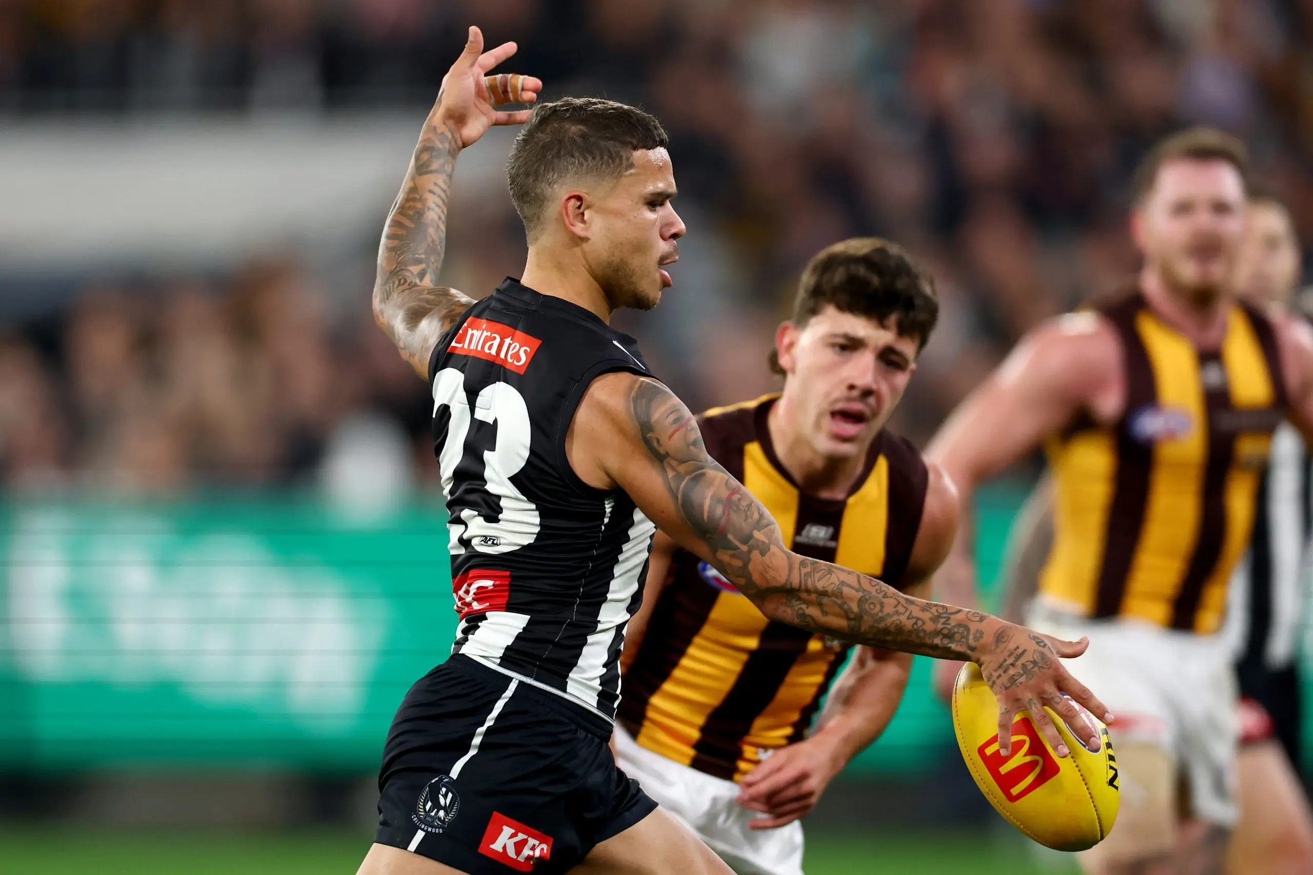 MELBOURNE, AUSTRALIA - MAY 30: Bobby Hill of the Magpies kicks during the round 12 AFL match between Collingwood Magpies and Hawthorn Hawks at Melbourne Cricket Ground, on May 30, 2025, in Melbourne, Australia. (Photo by Josh Chadwick/AFL Photos/via Getty Images)