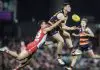 SYDNEY, AUSTRALIA - MAY 31: Mark Keane of the Crows  attempts a mark under pressure from Caiden Cleary of the Swans during the round 12 AFL match between Sydney Swans and Adelaide Crows at Sydney Cricket Ground, on May 31, 2025, in Sydney, Australia. (Photo by Mark Evans/AFL Photos/via Getty Images)