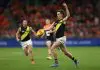 SYDNEY, AUSTRALIA - MAY 31: Luke Trainor of the Tigers kicks during the round 12 AFL match between Greater Western Sydney Giants and Richmond Tigers at ENGIE Stadium, on May 31, 2025, in Sydney, Australia. (Photo by Jason McCawley/Getty Images)