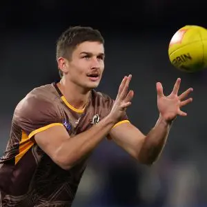 MELBOURNE, AUSTRALIA - JUNE 05: Sam Butler of the Hawks warms up ahead of the round 13 AFL match between Western Bulldogs and Hawthorn Hawks at Marvel Stadium, on June 05, 2025, in Melbourne, Australia. (Photo by Morgan Hancock/Getty Images)