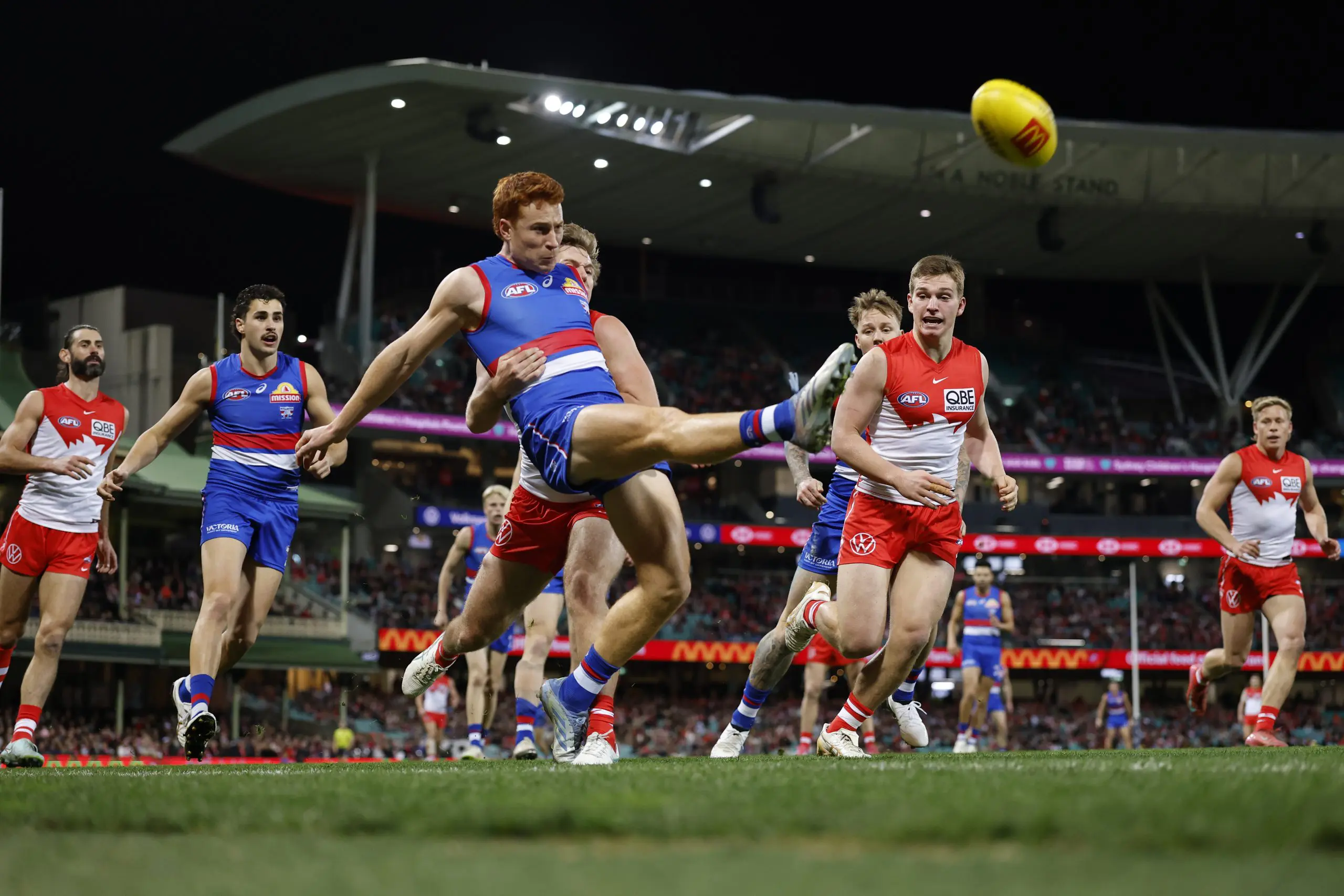SYDNEY, AUSTRALIA - JUNE 27: Ed Richards of the Bulldogs kicks the ball during the round 16 AFL match between Sydney Swans and Western Bulldogs at Sydney Cricket Ground on June 27, 2025 in Sydney, Australia. (Photo by Darrian Traynor/AFL Photos/via Getty Images)