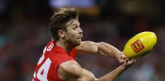 SYDNEY, AUSTRALIA - JUNE 27: Dane Rampe of the Swans handballs during the round 16 AFL match between Sydney Swans and Western Bulldogs at Sydney Cricket Ground on June 27, 2025 in Sydney, Australia. (Photo by Darrian Traynor/AFL Photos/via Getty Images)