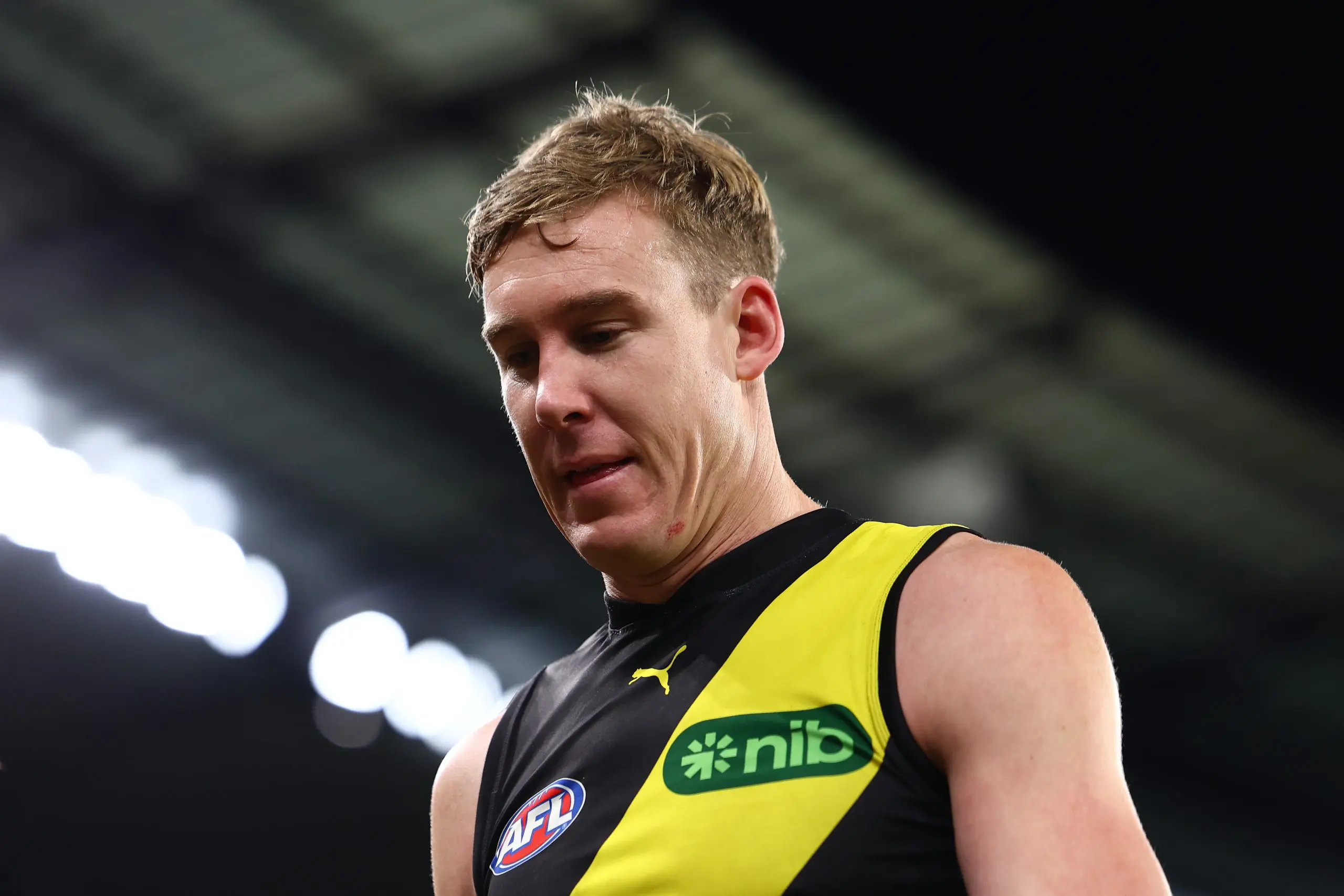 MELBOURNE, AUSTRALIA - JUNE 29: Tom Lynch of the Tigers walks from the ground after the round 16 AFL match between Richmond Tigers and Adelaide Crows at Melbourne Cricket Ground on June 29, 2025 in Melbourne, Australia. (Photo by Morgan Hancock/Getty Images)