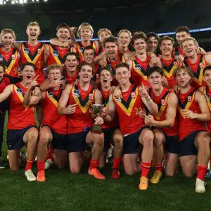 MELBOURNE, AUSTRALIA - JUNE 29: South Australia celebrate after winning the National Championship title following the 2025 Marsh AFL National Championships U18 Boys match between Victoria Country and South Australia at Marvel Stadium on June 29, 2025 in Melbourne, Australia. (Photo by Rob Lawson/AFL Photos)