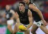 MELBOURNE, AUSTRALIA - APRIL 18: Adam Cerra of the Blues handballs during the round six AFL match between North Melbourne Kangaroos and Carlton Blues at Marvel Stadium, on April 18, 2025, in Melbourne, Australia. (Photo by Daniel Pockett/Getty Images)