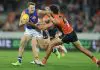 CANBERRA, AUSTRALIA - APRIL 26: Bailey Dale of the Bulldogs breaks the tackle of Jake Riccardi of the Giants during the round seven AFL match between GWS Giants and Western Bulldogs at Manuka Oval, on April 26, 2025, in Canberra, Australia. (Photo by Mark Metcalfe/AFL Photos/via Getty Images)