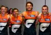 GEELONG, AUSTRALIA - MAY 11: Jacob Wehr, Josaia Delana, Jake Riccardi and Xavier O'Halloran of the Giants sing the song in the rooms after winning the round nine AFL match between Geelong Cats and GWS Giants at GMHBA Stadium, on May 11, 2025, in Geelong, Australia. (Photo by Josh Chadwick/Getty Images)