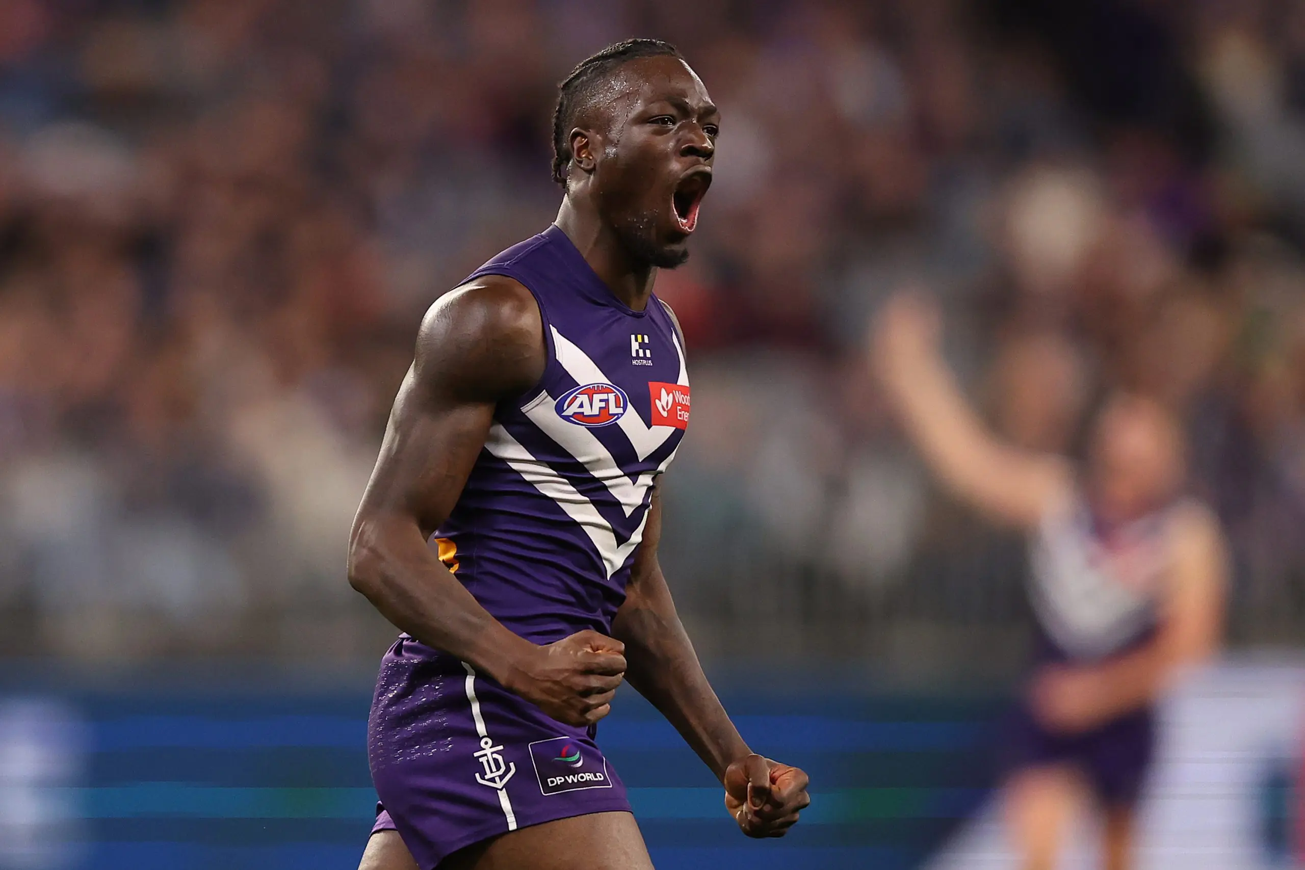 PERTH, AUSTRALIA - JUNE 19: Michael Frederick of the Dockers celebrates a goal during the round 15 AFL match between the Fremantle Dockers and Essendon Bombers at Optus Stadium, on June 19, 2025, in Perth, Australia. (Photo by Paul Kane/Getty Images)
