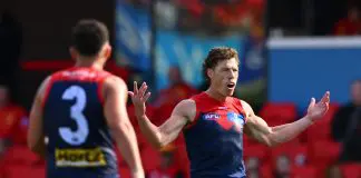GOLD COAST, AUSTRALIA - JUNE 28: Jake Melksham of the Demons celebrates kicking a goal during the round 16 AFL match between Gold Coast Suns and Melbourne Demons at People First Stadium on June 28, 2025 in Gold Coast, Australia. (Photo by Matt Roberts/AFL Photos/via Getty Images)