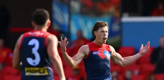 GOLD COAST, AUSTRALIA - JUNE 28: Jake Melksham of the Demons celebrates kicking a goal during the round 16 AFL match between Gold Coast Suns and Melbourne Demons at People First Stadium on June 28, 2025 in Gold Coast, Australia. (Photo by Matt Roberts/AFL Photos/via Getty Images)