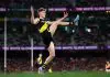 LATE CHANGE: Richmond vs Adelaide – Round 9, 2026 MELBOURNE, AUSTRALIA - JULY 12: Luke Trainor of the Tigers kicks the ball during the round 18 AFL match between Richmond Tigers and Essendon Bombers at Melbourne Cricket Ground on July 12, 2025 in Melbourne, Australia. (Photo by Morgan Hancock/Getty Images via AFL Photos)