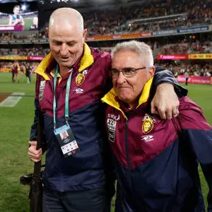 BRISBANE, AUSTRALIA - SEPTEMBER 01: Danny Daly and Chris Fagan, Senior Coach of the Lions celebrate during the 2022 AFL Second Elimination Final match between the Brisbane Lions and the Richmond Tigers at The Gabba on September 1, 2022 in Brisbane, Australia. (Photo by Michael Willson/AFL Photos via Getty Images)