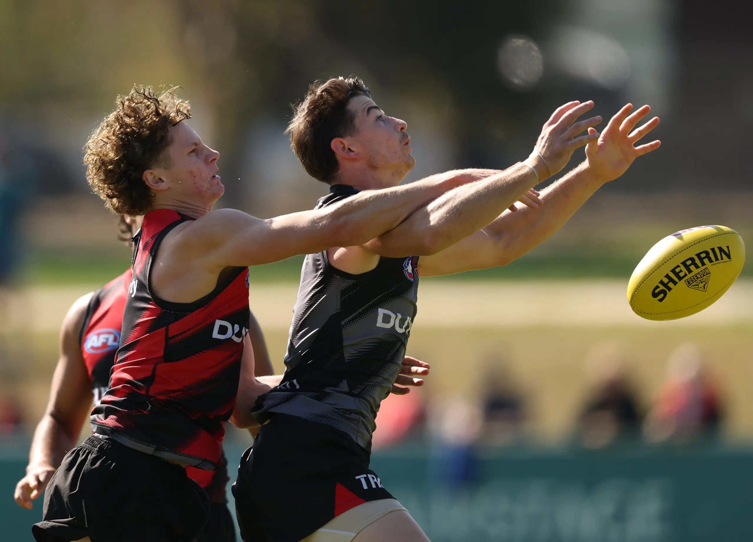 MELBOURNE, AUSTRALIA - APRIL 09: Rhys Unwin of the Bombers challenges Jaxon Prior of the Bombers during an Essendon Bombers AFL training session at The Hangar on April 09, 2025 in Melbourne, Australia. (Photo by Robert Cianflone/Getty Images)