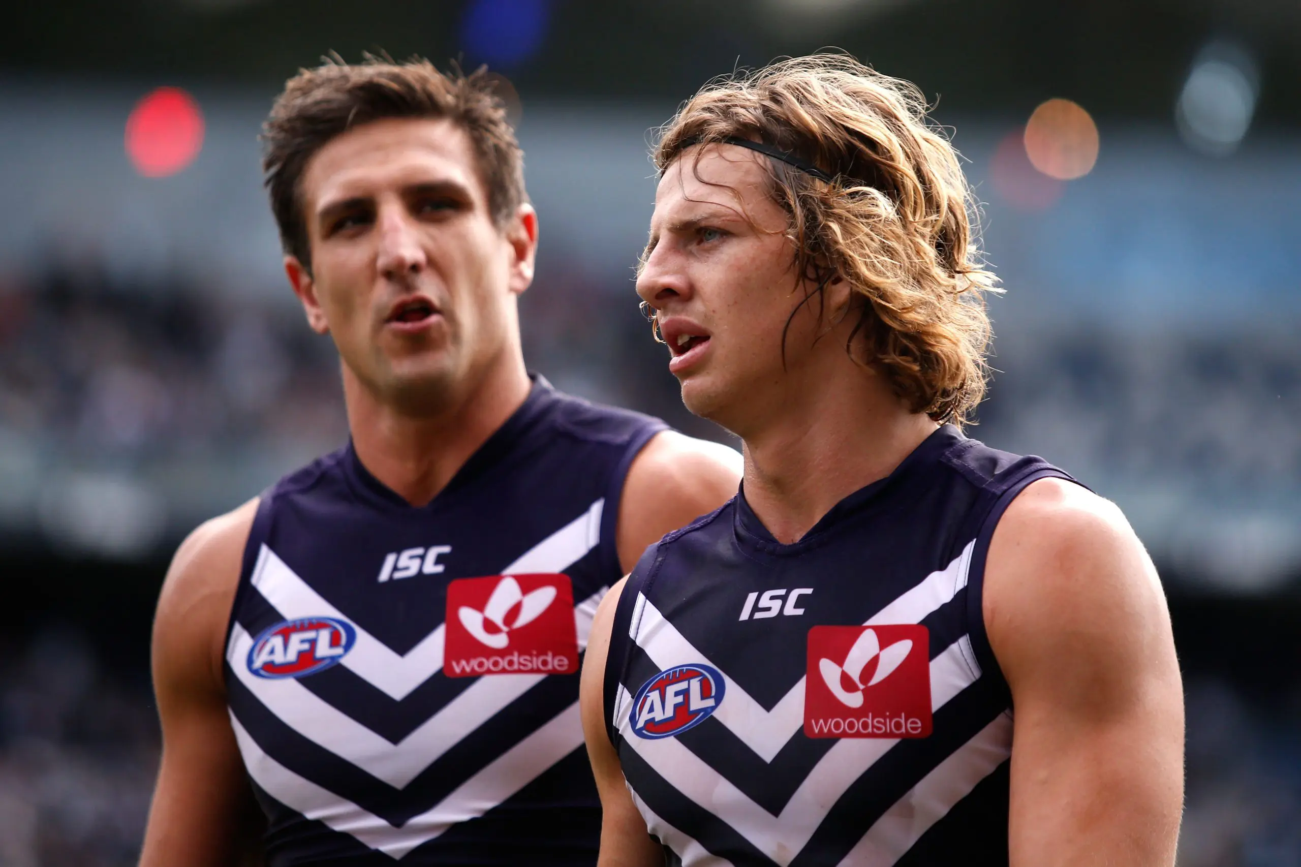 GEELONG, VICTORIA - APRIL 12: Matthew Pavlich and Nat Fyfe of the Dockers head to the rooms at half time during the round two AFL match between the Geelong Cats and the Fremantle Dockers at Simonds Stadium on April 12, 2015 in Geelong, Australia. (Photo by Darrian Traynor/AFL/Getty Images)