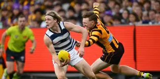 AFL Pre-Season Fixture: Your team’s Community Series and match simulation opponents MELBOURNE, AUSTRALIA - APRIL 21: Zach Guthrie of the Cats is tackled by James Sicily of the Hawks during the round six AFL match between Geelong Cats and Hawthorn Hawks at Melbourne Cricket Ground, on April 21, 2025, in Melbourne, Australia. (Photo by Quinn Rooney/Getty Images)