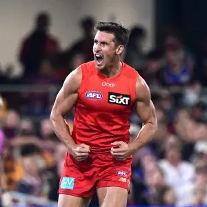 BRISBANE, AUSTRALIA - MAY 04: David Swallow of the Suns celebrates kicking a goal during the round eight AFL match between Brisbane Lions and Gold Coast Suns at The Gabba, on May 04, 2025, in Brisbane, Australia. (Photo by Bradley Kanaris/Getty Images)
