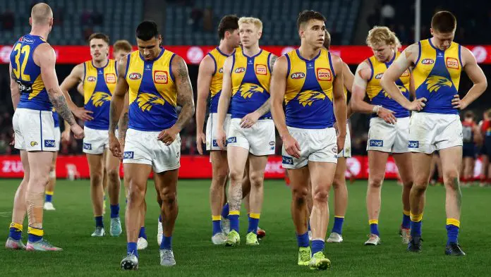 MELBOURNE, AUSTRALIA - AUGUST 02: The Eagles look dejected after a loss during the 2025 AFL Round 21 match between the Melbourne Demons and the West Coast Eagles at Marvel Stadium on August 2, 2025 in Melbourne, Australia. (Photo by Michael Willson/AFL Photos via Getty Images)