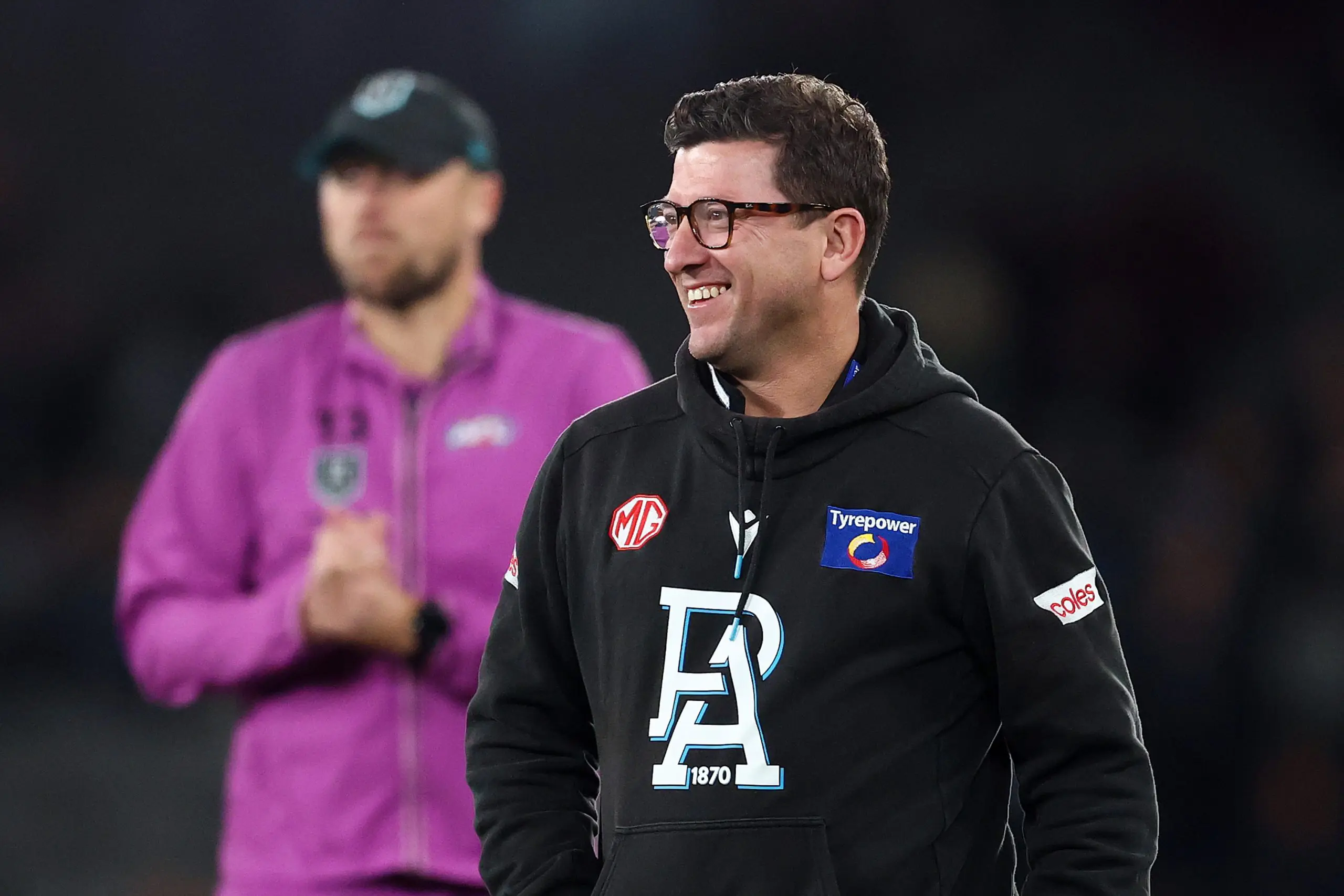 MELBOURNE, AUSTRALIA - AUGUST 16: Josh Carr, Assistant coach of the Power looks on ahead of the round 23 AFL match between Carlton Blues and Port Adelaide Power at Marvel Stadium on August 16, 2025 in Melbourne, Australia. (Photo by Morgan Hancock/Getty Images)