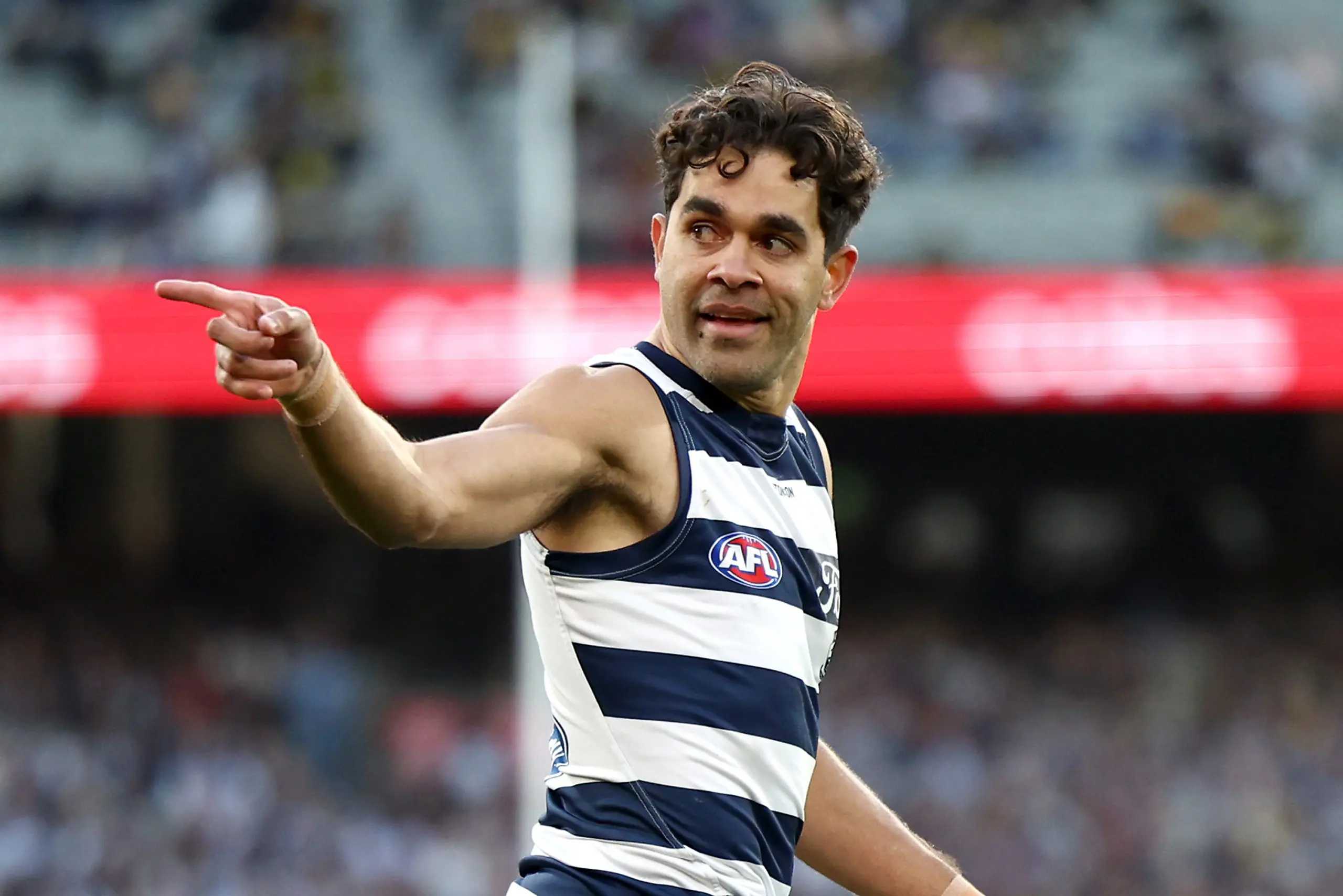 MELBOURNE, AUSTRALIA - AUGUST 23: Jack Martin of the Cats celebrates a goal during the round 24 AFL match between Richmond Tigers and Geelong Cats at Melbourne Cricket Ground on August 23, 2025 in Melbourne, Australia. (Photo by Jonathan DiMaggio/AFL Photos/via Getty Images)