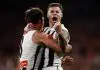 ADELAIDE, AUSTRALIA - SEPTEMBER 04: Lachie Schultz (left) and Jamie Elliott of the Magpies celebrate during the AFL First Qualifying Final match between the Adelaide Crows and the Collingwood Magpies at Adelaide Oval on September 04, 2025 in Adelaide, Australia. (Photo by Michael Willson/AFL Photos via Getty Images)