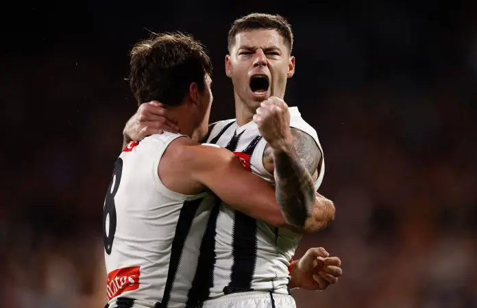 ADELAIDE, AUSTRALIA - SEPTEMBER 04: Lachie Schultz (left) and Jamie Elliott of the Magpies celebrate during the AFL First Qualifying Final match between the Adelaide Crows and the Collingwood Magpies at Adelaide Oval on September 04, 2025 in Adelaide, Australia. (Photo by Michael Willson/AFL Photos via Getty Images)