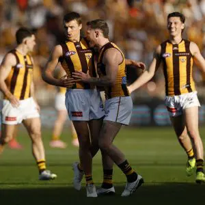 SYDNEY, AUSTRALIA - SEPTEMBER 06: Jack Ginnivan of the Hawks is congratulated by Blake Hardwick after kicking a goal during the AFL Elimination Final match between Greater Western Sydney Giants and Hawthorn Hawks at ENGIE Stadium on September 06, 2025 in Sydney, Australia. (Photo by Darrian Traynor/Getty Images)