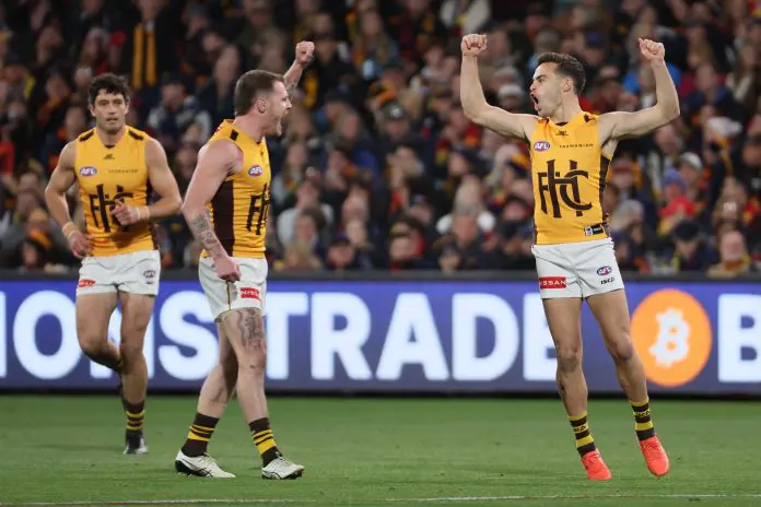 ADELAIDE, AUSTRALIA - SEPTEMBER 12: Karl Amon of the Hawks celebrates a goal during the AFL First Semi Final match between the Adelaide Crows and the Hawthorn Hawks at Adelaide Oval on September 12, 2025 in Adelaide, Australia. (Photo by James Elsby/AFL Photos via Getty Images)