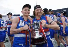 Channel 7 to abandon VFL broadcast coverage MELBOURNE, AUSTRALIA - SEPTEMBER 21: Adam Treloar of the Bulldogs and Oskar Baker of the Bulldogs pose with the trophy after winning the 2025 VFL Grand Final match between Footscray Bulldogs and Southport Sharks at Ikon Park on September 21, 2025 in Melbourne, Australia. (Photo by Daniel Pockett/Getty Images)