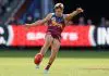 MELBOURNE, AUSTRALIA - SEPTEMBER 27: Zac Bailey of the Lions kicks the ball during the AFL Grand Final match between the Geelong Cats and the Brisbane Lions at the Melbourne Cricket Ground on September 27, 2025 in Melbourne, Australia. (Photo by Michael Willson/AFL Photos via Getty Images)