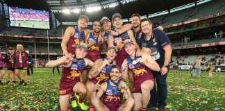 MELBOURNE, AUSTRALIA - SEPTEMBER 27: Levi Ashcroft, Kai Lohmann, Callum Ah Chee, Ty Gallop, Cam Rayner, Charlie Cameron, Zac Bailey, Logan Morris, Stuart Dew during the AFL Grand Final match between the Geelong Cats and the Brisbane Lions at the Melbourne Cricket Ground on September 27, 2025 in Melbourne, Australia. (Photo by James Wiltshire/AFL Photos via Getty Images)