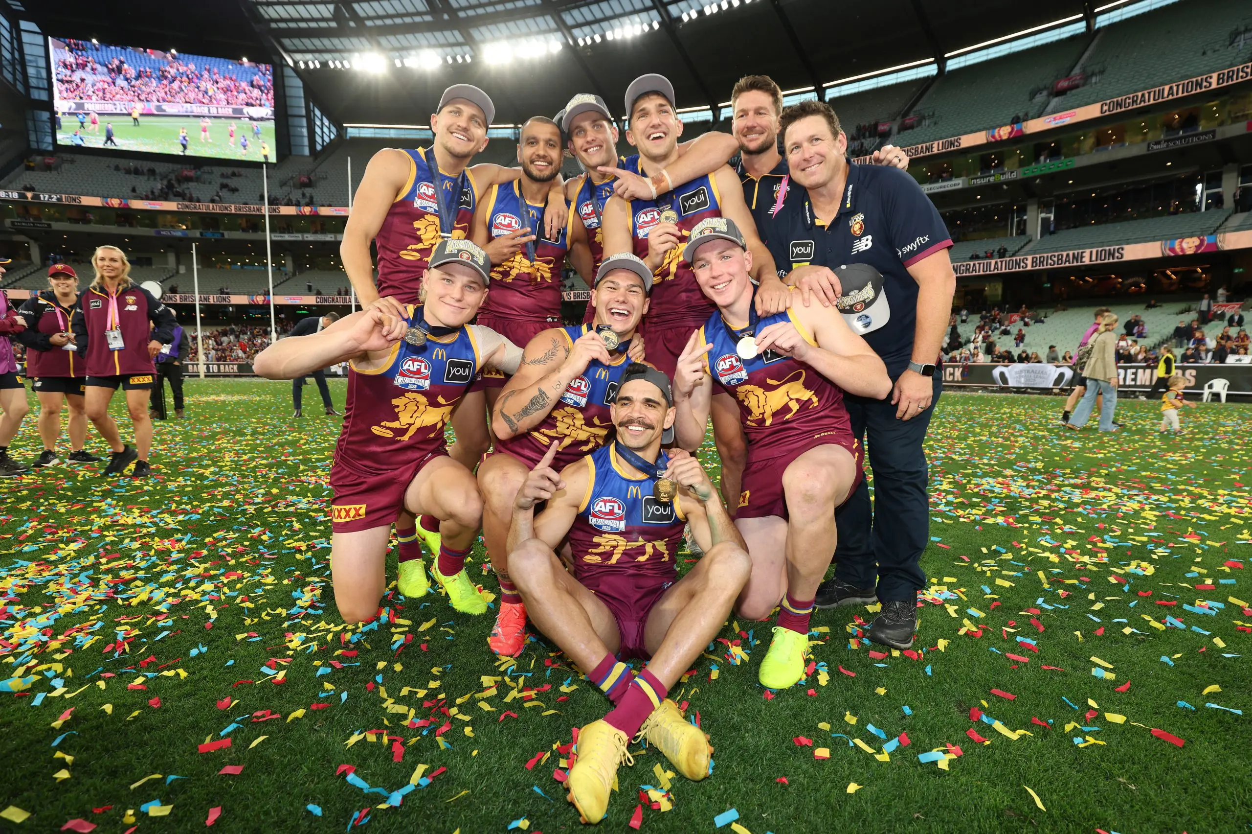 MELBOURNE, AUSTRALIA - SEPTEMBER 27: Levi Ashcroft, Kai Lohmann, Callum Ah Chee, Ty Gallop, Cam Rayner, Charlie Cameron, Zac Bailey, Logan Morris, Stuart Dew during the AFL Grand Final match between the Geelong Cats and the Brisbane Lions at the Melbourne Cricket Ground on September 27, 2025 in Melbourne, Australia. (Photo by James Wiltshire/AFL Photos via Getty Images)