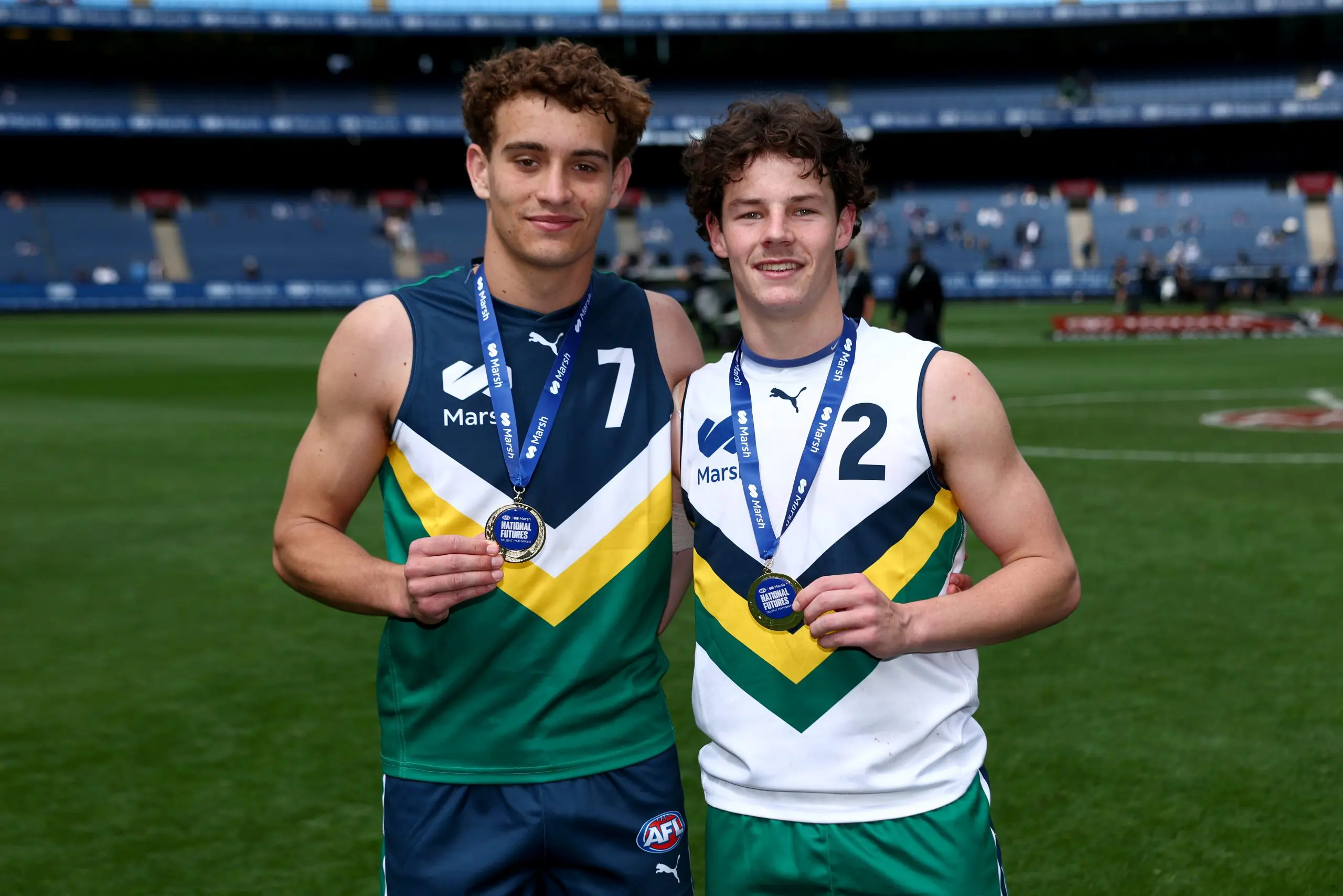 MELBOURNE, AUSTRALIA - SEPTEMBER 27: Cody Walker of Team Docherty and Noah Willliams of Team Boak pose after being awarded best on ground during the Marsh AFL National Futures Boys match between Team Boak and Team Docherty at Melbourne Cricket Ground, on September 27, 2025 in Melbourne, Australia. (Photo by Josh Chadwick/AFL Photos/via Getty Images)
