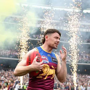 MELBOURNE, AUSTRALIA - SEPTEMBER 27: Lachie Neale of the Lions runs onto the field during the AFL Grand Final match between Geelong Cats and Brisbane Lions at Melbourne Cricket Ground on September 27, 2025 in Melbourne, Australia. (Photo by Cameron Spencer/AFL Photos/via Getty Images)