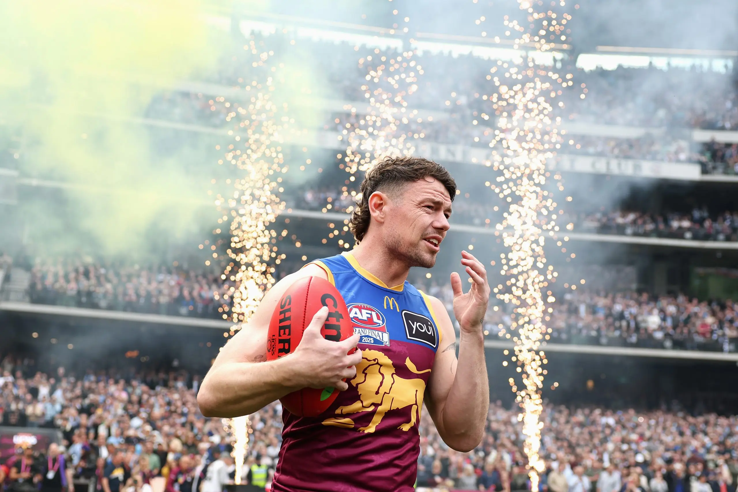 MELBOURNE, AUSTRALIA - SEPTEMBER 27: Lachie Neale of the Lions runs onto the field during the AFL Grand Final match between Geelong Cats and Brisbane Lions at Melbourne Cricket Ground on September 27, 2025 in Melbourne, Australia. (Photo by Cameron Spencer/AFL Photos/via Getty Images)