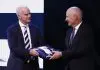 MELBOURNE, AUSTRALIA - MARCH 09: Chairman of the AFL Commission Richard Goyder (R) presents Geelong President
Craig Drummond with the 2022 AFL Premiership Flag during the 2023 Toyota AFL Premiership Season Launch at Malthouse Theatre on March 09, 2023 in Melbourne, Australia. (Photo by Daniel Pockett/AFL Photos/Getty Images)