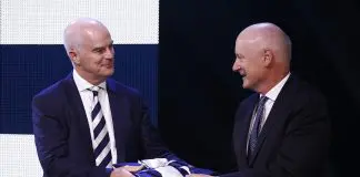Former Geelong president makes huge admission on concussion saga MELBOURNE, AUSTRALIA - MARCH 09: Chairman of the AFL Commission Richard Goyder (R) presents Geelong President
Craig Drummond with the 2022 AFL Premiership Flag during the 2023 Toyota AFL Premiership Season Launch at Malthouse Theatre on March 09, 2023 in Melbourne, Australia. (Photo by Daniel Pockett/AFL Photos/Getty Images)