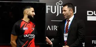 Essendon caretaker comments on coaching vacancy MELBOURNE, AUSTRALIA - MARCH 27: Dean Solomon presents debutant Saad El-Hawli of the Bombers during the 2025 AFL Round 03 match between the Essendon Bombers and the Port Adelaide Power at Marvel Stadium on March 27, 2025 in Melbourne, Australia. (Photo by Michael Willson/AFL Photos via Getty Images)