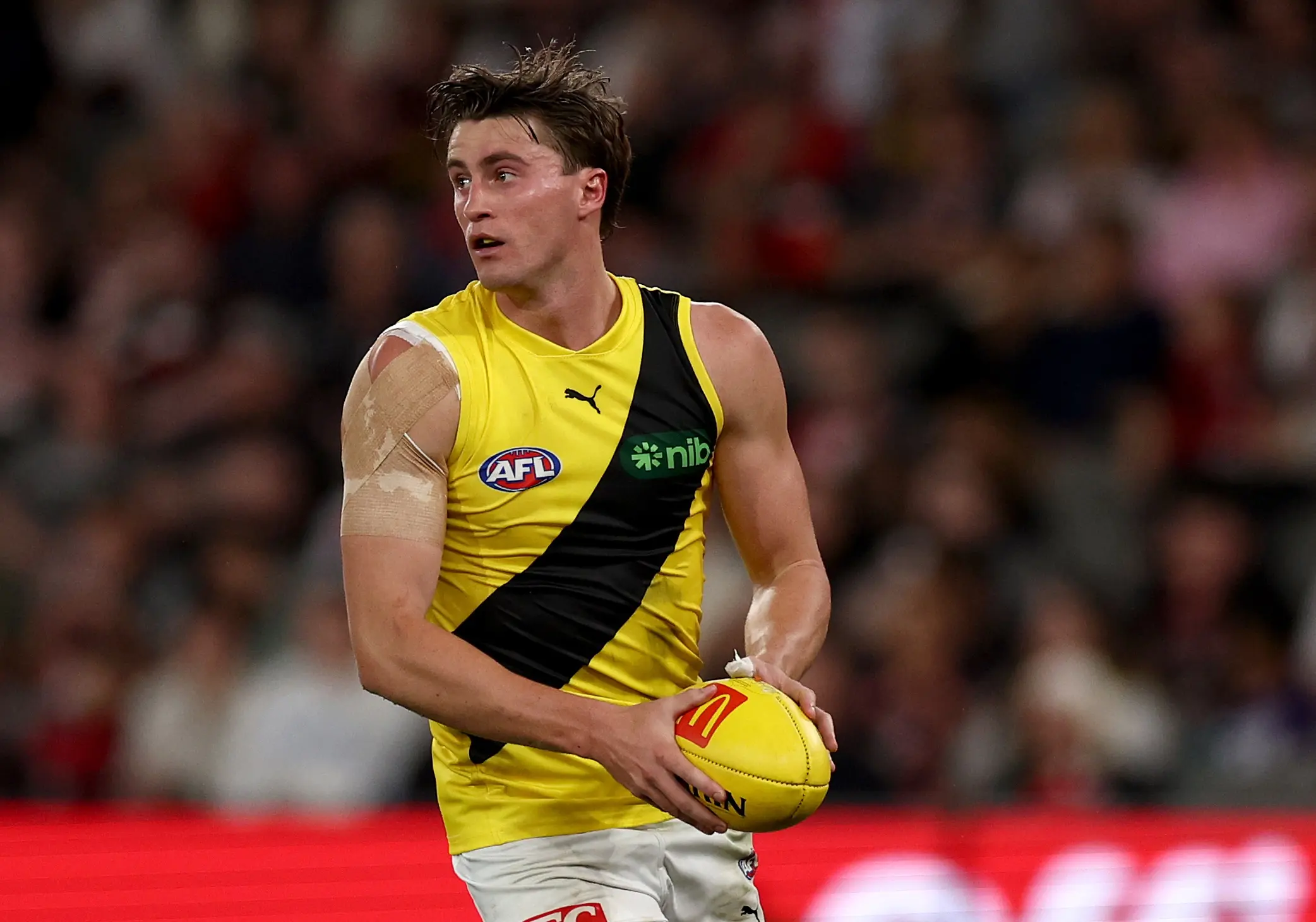MELBOURNE, AUSTRALIA - MARCH 29: Jacob Blight of the Tigers in action during the round three AFL match between St Kilda Saints and Richmond Tigers at Marvel Stadium, on March 29, 2025, in Melbourne, Australia. (Photo by Jonathan DiMaggio/Getty Images)
